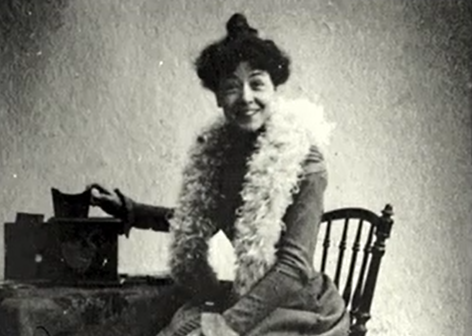 Black and white photo of Alice Guy Blaché, a pioneer filmmaker whose love of literature and theater led to innovations in cinematic storytelling. 
