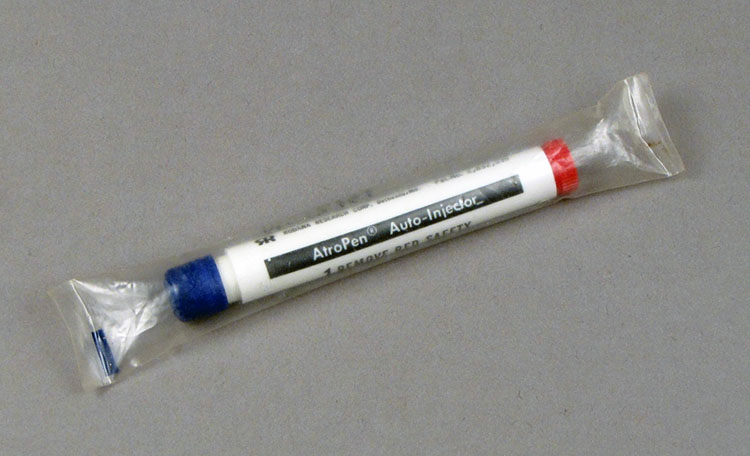 Tubular injector in see-through plastic wrapper