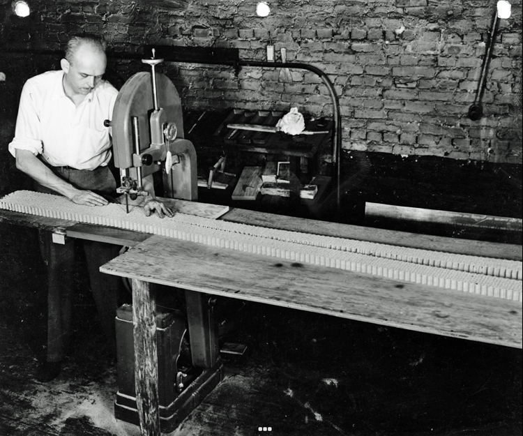 Howard Head cutting the honeycomb core for his skis.