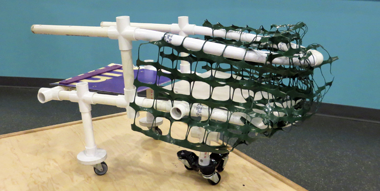 A visitor to SparkLab created a new type of shopping cart by connecting PVC pipes and adding plastic net fencing and three-point wheels, perhaps for improved maneuverability