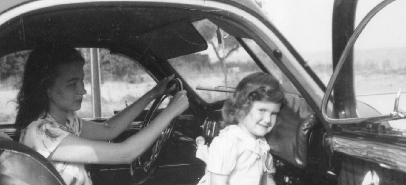The Straith padded dashboard is demonstrated in this photo by the inventor’s daughter, Jean Straith Hepner, and granddaughter, Grace Quitzow.