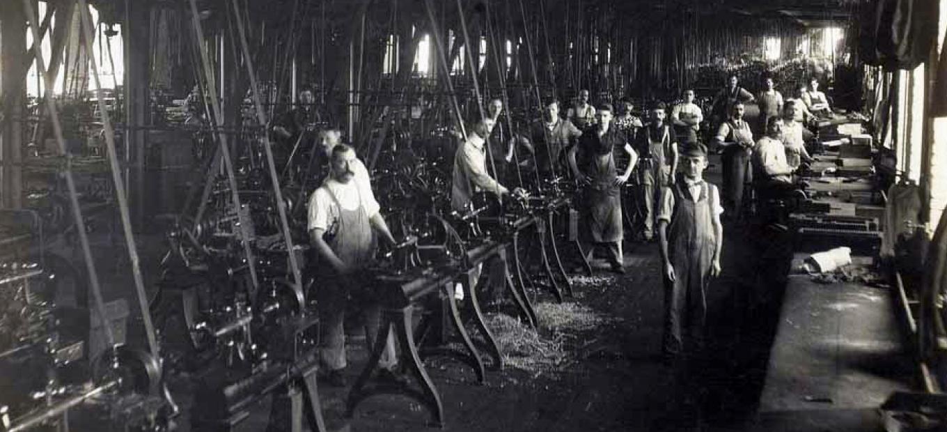 Workers on the shop floor of the Colt Armory