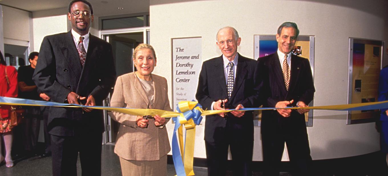 4 people at ribbon cutting ceremony