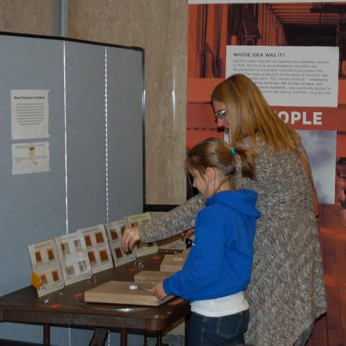 Visitors test an interactive for the Hartford case study in Places of Invention