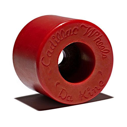 Single red urethane skateboard wheel, with the words “Cadillac Wheels Da Kine” molded into it. Da Kine is derived from a Hawaiian word meaning “the best.”