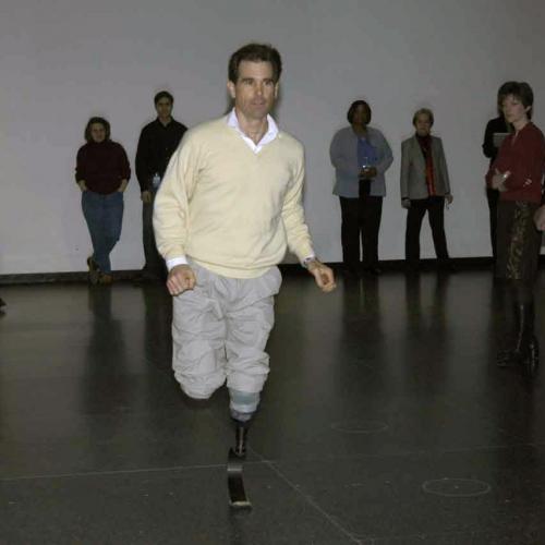 Photo of Van Phillips running using his invention, the Flex-Foot