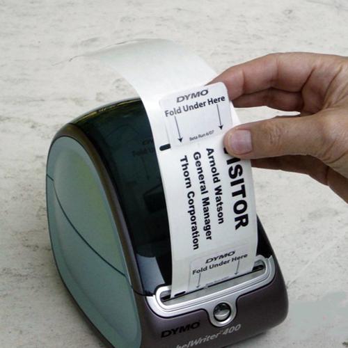 A small thermal printer producing a time badge.